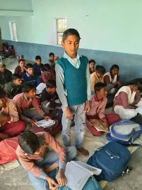 Student in a classroom powered by solar in rural India.