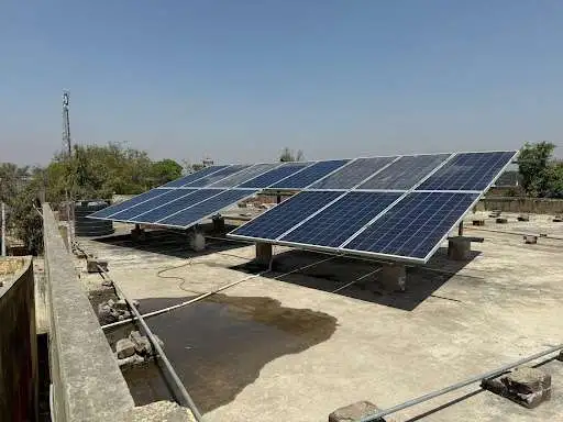 Rooftop solar panel installation in rural India